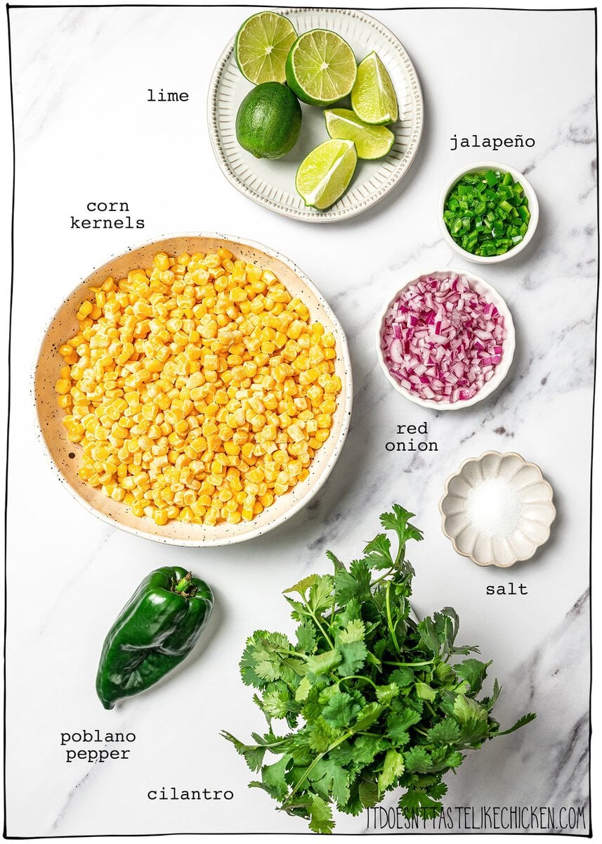 Made with charred corn, roasted poblano, cilantro, lime and red onion, this copycat Chipotle corn salsa is bright, smoky and so delicious! Ingredients for corn salsa with labels.