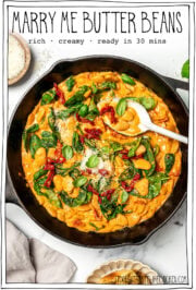 Skillet of creamy beans with text overlay that reads marry me butter beans.