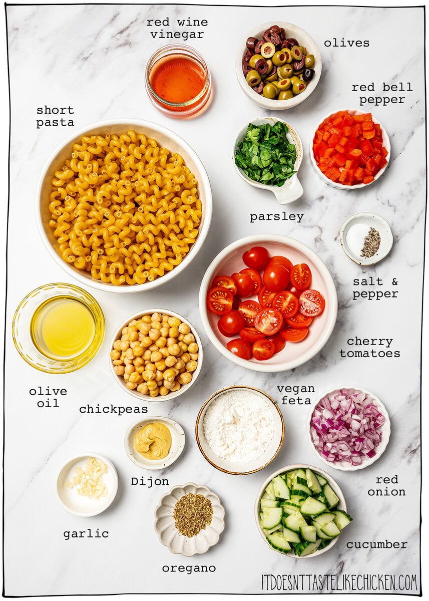 Bowl of pasta salad with text overlay that reads Mediterranean chickpea pasta salad. Ingredients for Mediterranean chickpea pasta salad.