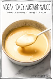 Spoonful of mustard sauce drizzling into bowl with text overlay that reads vegan honey mustard sauce.