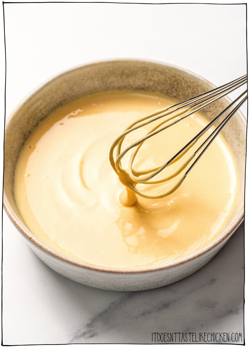This homemade Vegan Honey Mustard Sauce is creamy, tangy, sweet, and ready in just 5 minutes, perfect for dipping ALL the things! Whisk in bowl of vegan honey mustard sauce.