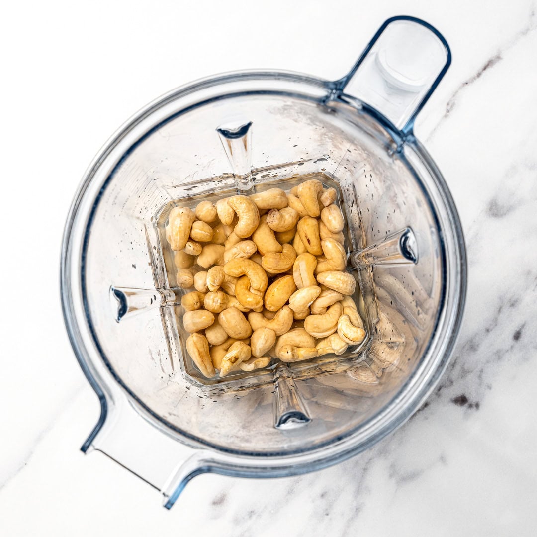 Water and cashews in blender.