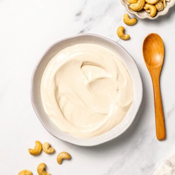 Bowl of vegan sour cream made with cashews.