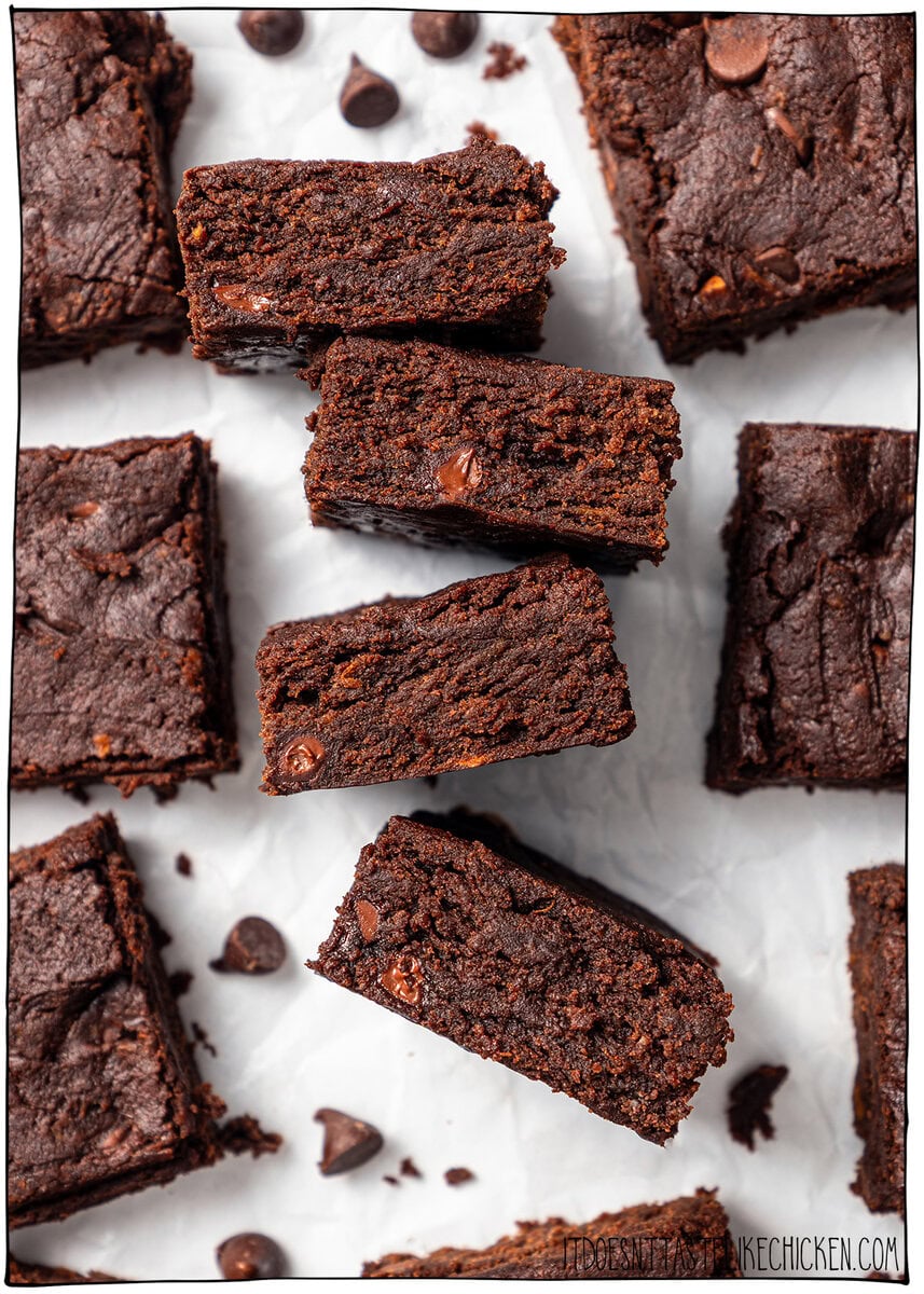 These vegan Sweet Potato Brownies are rich, fudgy, and loaded with deep chocolate flavor. You'd never know they're made with sweet potatoes! Sweet potato brownies with 4 turned on their side to show texture.