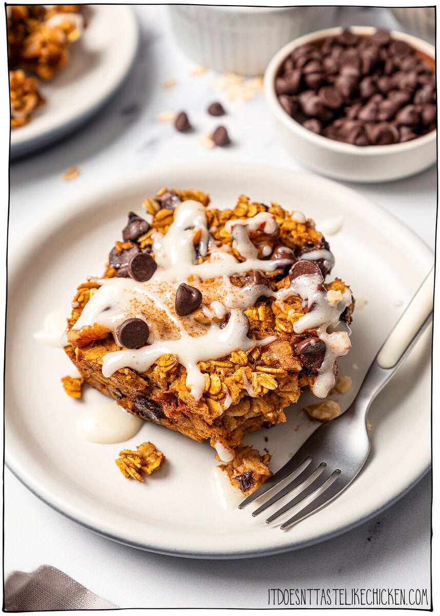 Pumpkin baked oatmeal on plate with cream cheese glaze.