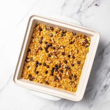 Vegan pumpkin baked oatmeal in pan before baking.