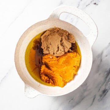 Wet ingredients for sweet potato brownies in bowl.
