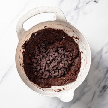 Chocolate chips added to sweet potato brownie batter.